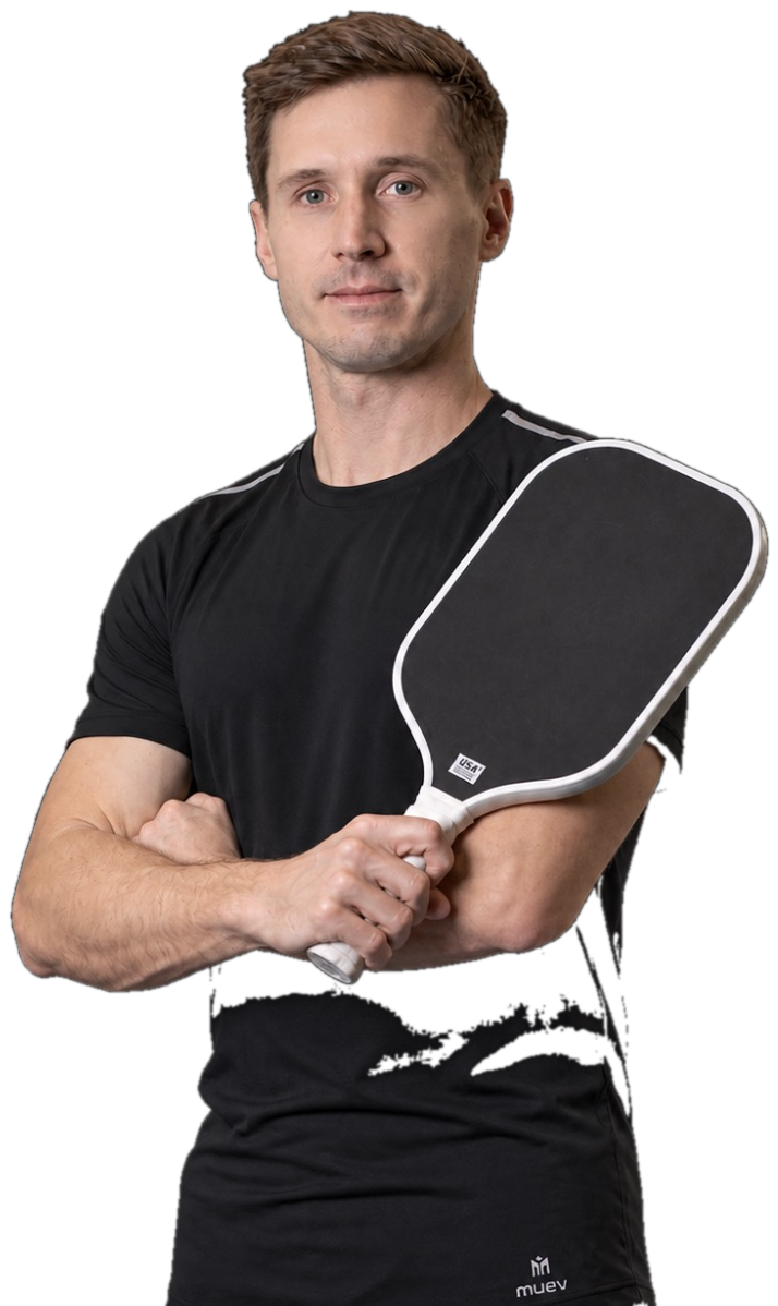 Dr. Brien Lee holding a pickleball paddle