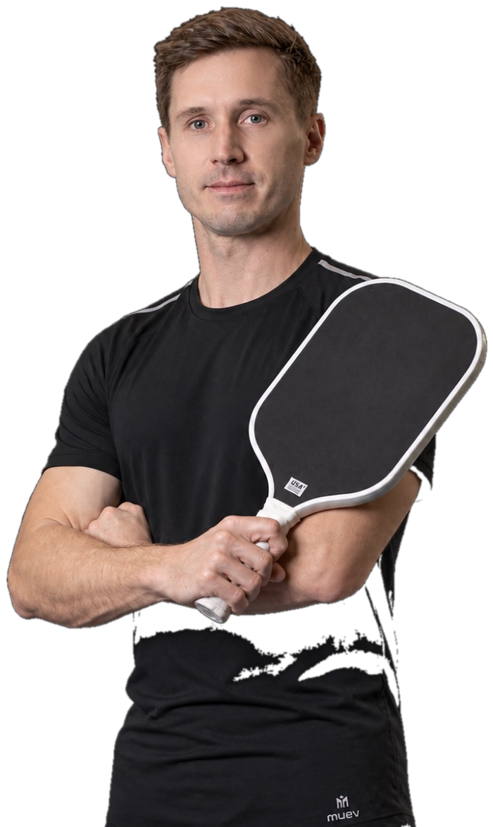 Dr. Brien Lee holding a pickleball paddle
